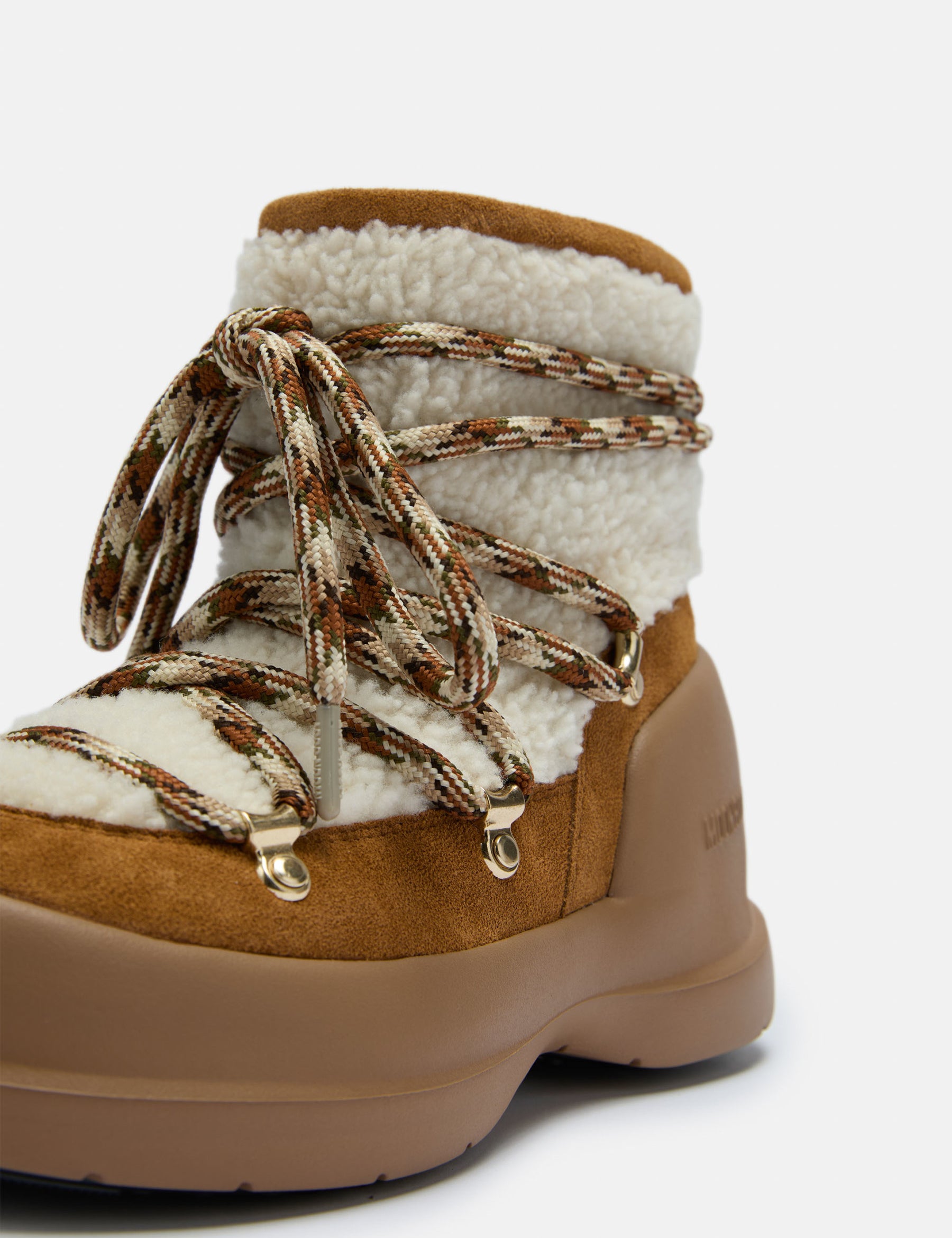 BOTTES MEZZALUNA EN SHEARLING